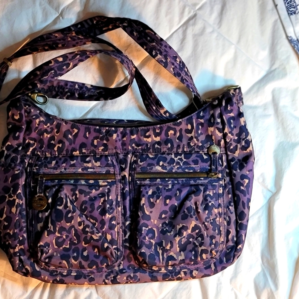 Travelon bag purple leopard print. 9.5x14x5.5"